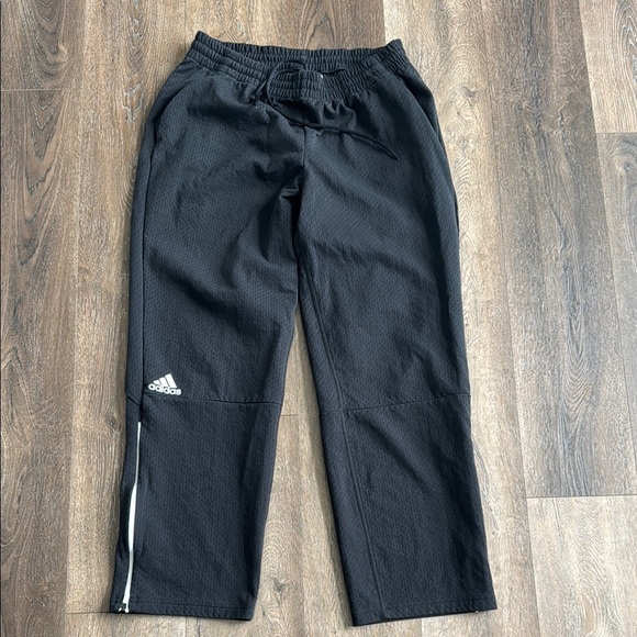 Adidas Pants.  Men’s size large.  Black, with zippers on the hem of the legs. - Picture 1 of 9